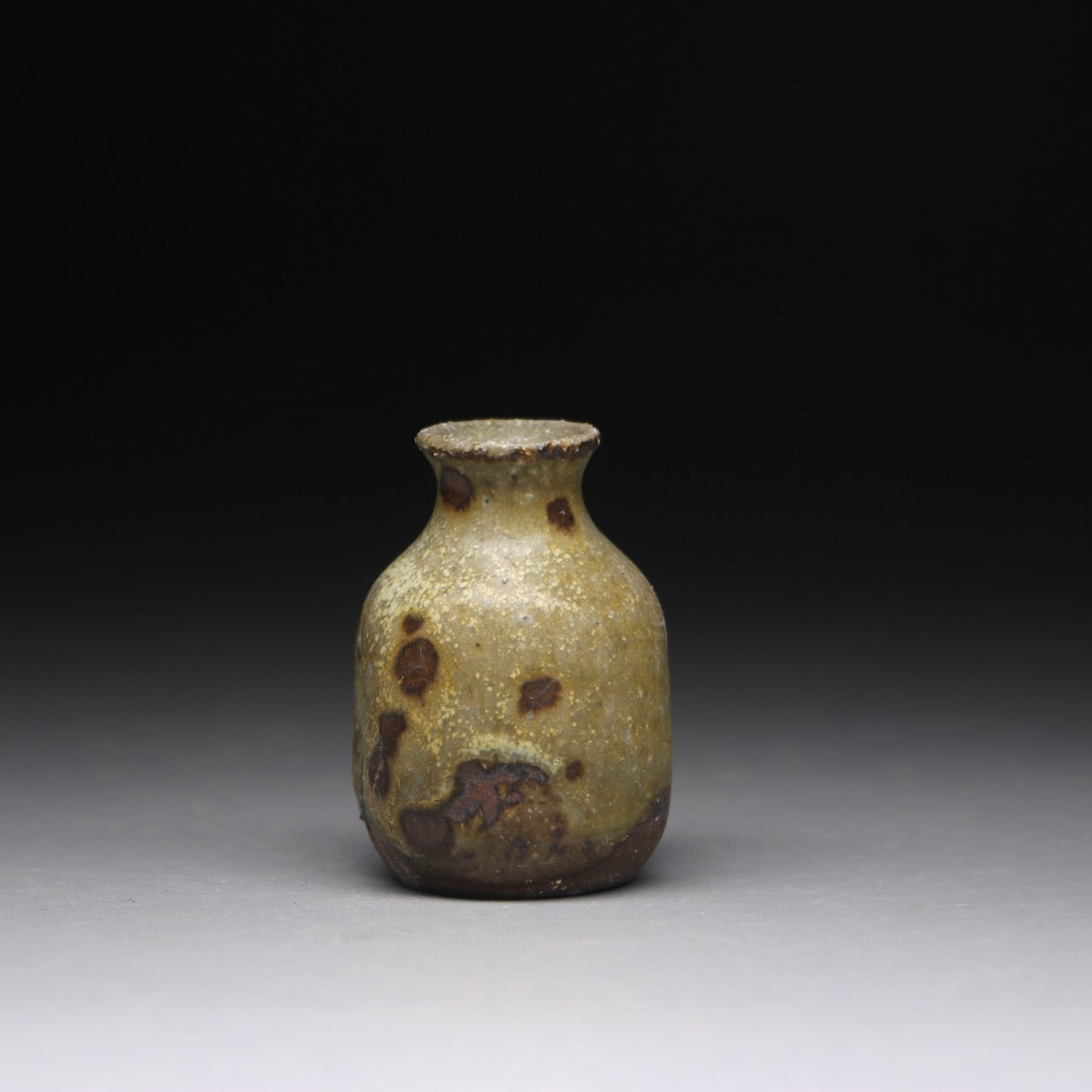 small ash glazed bud vase 5.5cm h x 4cm w
