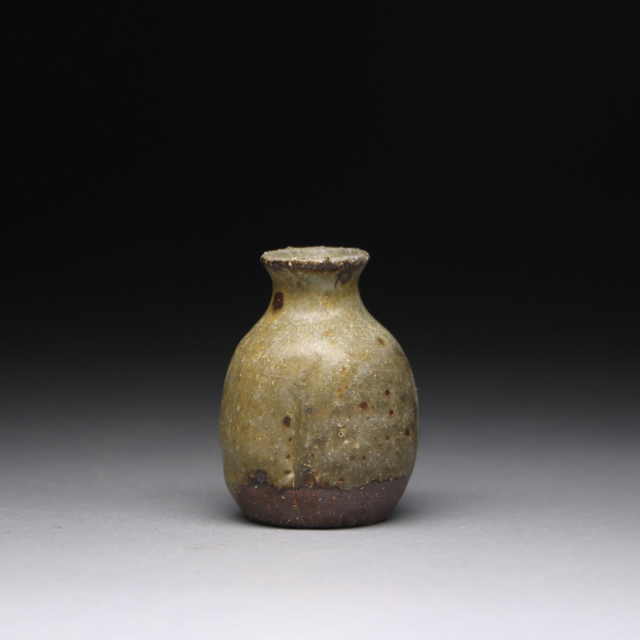 small ash glazed bud vase 5.5cm h x 4cm w